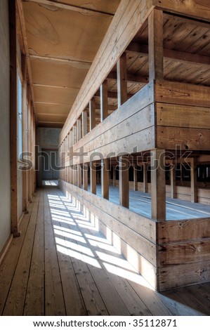 A representation of a row of bunk beds at a concentration camp memorial site.