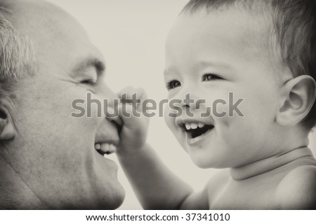 Grandfather and grandson. black and white. Focus on child