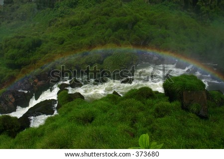 rainbow over flowing waters