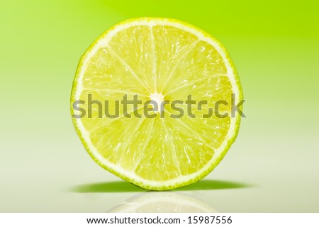 Fresh lime slice with fresh lime green gradient lighting