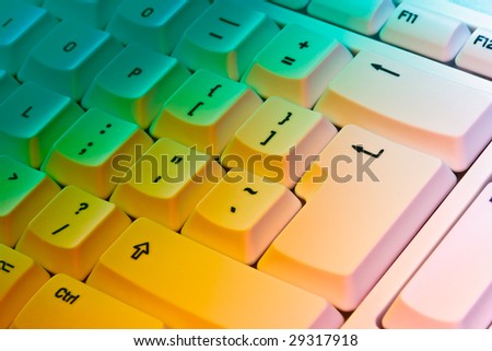 Computer Keyboard lit with colored studio gels
