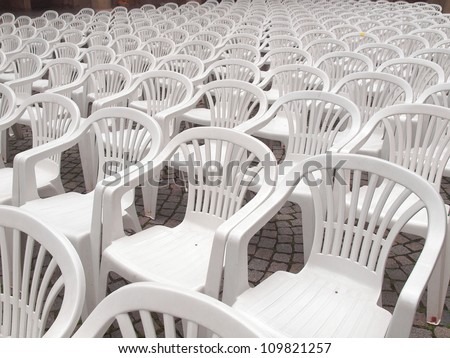 Rows of chairs for outdoor dehors alfresco bar and live gig concert open air events