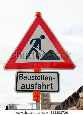 Road works sign for construction works in progress - in German