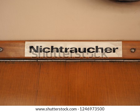 Nichtraucher (meaning Non smoking) sign on vintage German tram