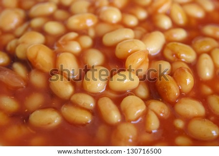 Detail of baked beans in tomato sauce - useful as a background