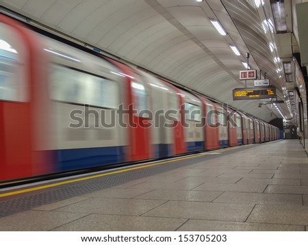 LONDON, ENGLAND, UK - JUNE 19: Train departing from an underground Tube Station on June 19, 2011 in London, England, UK