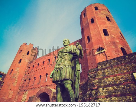 Vintage looking Julius Caesar monument at Palatine towers in Turin, Italy