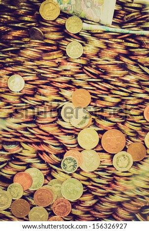 Vintage looking Bunch of British Pounds coins (UK currency)