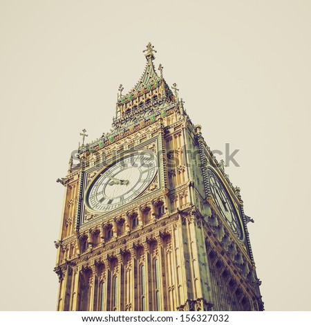 Vintage looking Big Ben at the Houses of Parliament, Westminster Palace, London, UK - isolated over white with copy space