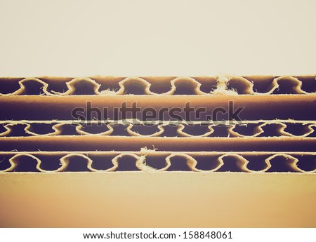 Vintage looking brown corrugated cardboard sheet background