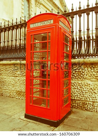 Vintage look Traditional red telephone box in London UK