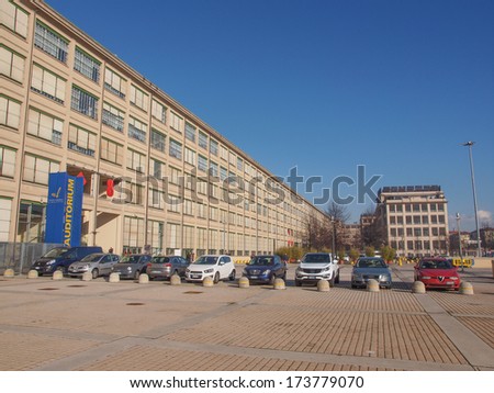 TURIN, ITALY - JANUARY 24, 2014: The Fiat Lingotto car factory designed by Trucco in 1916 was the largest car factory at the time and still houses the Fiat directional centre and an exhibition complex