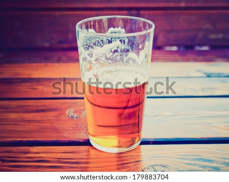 Vintage retro looking Large glass pint of beer alcoholic drink