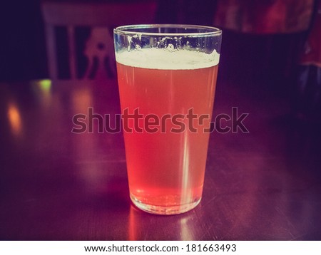 Vintage retro looking A pint of English bitter beer