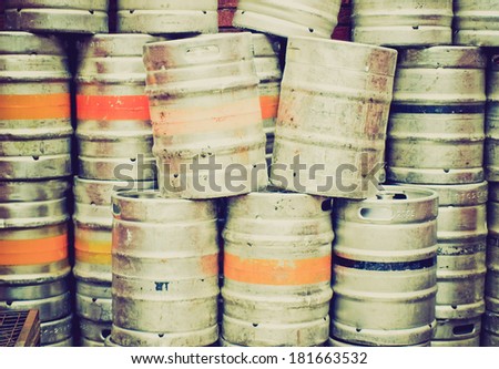 Vintage retro looking Range of stacked beer casks of kegs