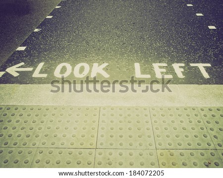 Vintage retro looking Look Left sign in a London street