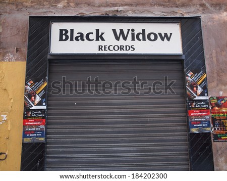 GENOA, ITALY - MARCH 16, 2014: Black Widow Records in Via del Campo is a small Italian record label specialising in rare and obscure prog and goth acts