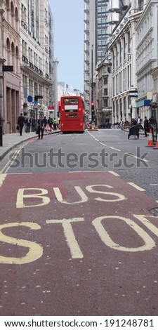 Busy street in thethe City of London, England, UK