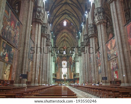 MILAN, ITALY - JUNE 18, 2012: People waiting to attend a mass at the cathedral