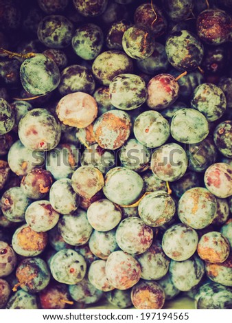 Vintage retro looking Detail of prune fruits - healthy vegetarian food - useful as a background