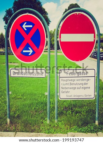 Vintage retro looking A road sign for a no parking area and no entry - in German