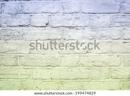 Brick wall background with English bond, painted white with blue and green hue