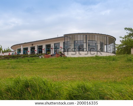 DESSAU, GERMANY - JUNE 13, 2014: Kornhaus meaning Granary is a restaurant designed by Carl Fieger in 1929 on the river Elbe in Dessau Rosslauer belonging to the Bauhaus