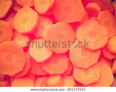 Vintage retro looking Orange carrot slices useful as a background