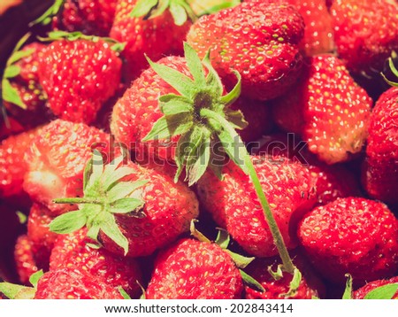 Vintage retro looking Strawberry fruit useful as a food background