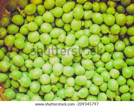 Vintage retro looking Green peas useful as a food background