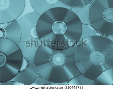 CD, DVD, BD (Bluray) optical discs for music, video and data storage - cool cyanotype