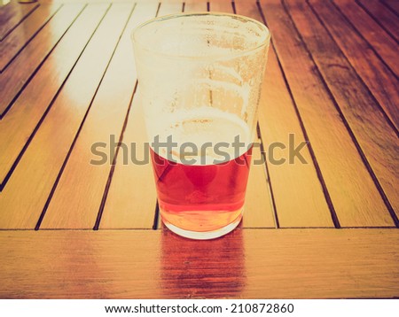 Vintage retro looking Large glass pint of beer alcoholic drink