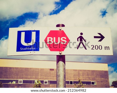 Vintage retro looking Ubahn underground metro subway tube and bus and pedestrian area sign