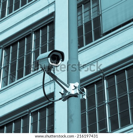Closed Circuit TV video camera for security surveillance - cool cyanotype