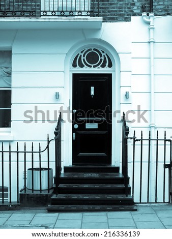 A picture of Traditional british home door, London - cool cyanotype