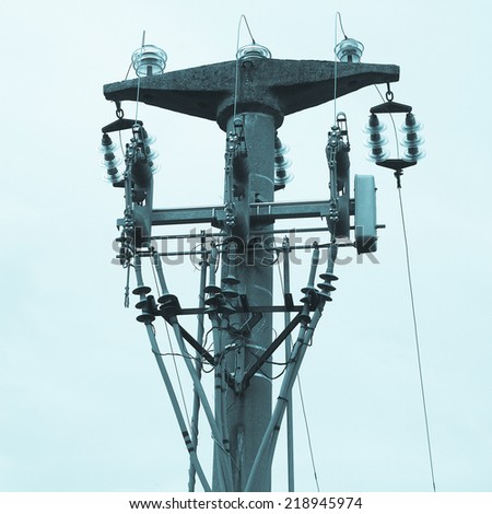 Electric transmission line tower mast with wires - cool cyanotype