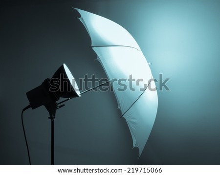 Light umbrella reflector used in photographic studio - cool cyanotype