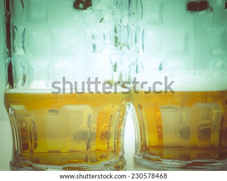 Vintage looking Many large glasses of German lager beer