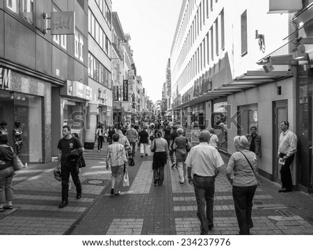 KOELN, GERMANY - AUGUST 04, 2009: Tourists strolling in the high street in Cologne, Germany