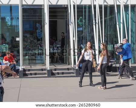 MILAN, ITALY - MARCH 28, 2015: People in front of the Expo Gate information centre in Milan as part of the Expo Milano 2015 international exhibition