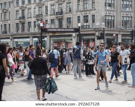 LONDON, UK - JUNE 12, 2015: Travellers at Oxford Circus underground station in London, UK