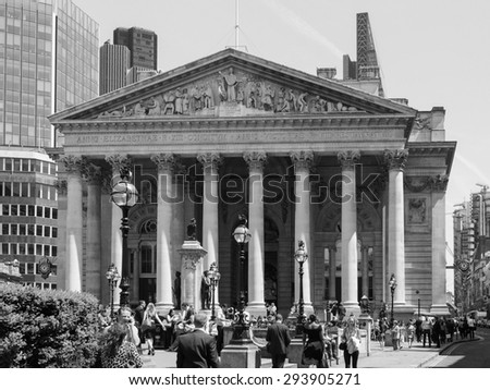 LONDON, UK - JUNE 11, 2015: People in front of The Royal Stock Exchange in black and white