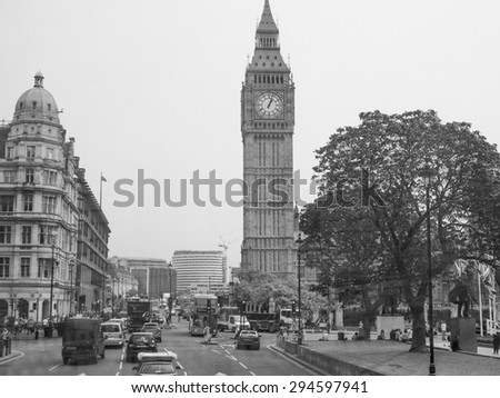 LONDON, UK - JUNE 12, 2015: Tourists in Parliament Square in Westminster in black and white
