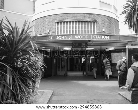 LONDON, UK - JUNE 10, 2015: Travellers at St John Wood underground station in black and white