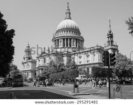 LONDON, UK - JUNE 11, 2015: People in front of St Paul Cathedral church in black and white