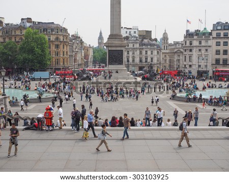 LONDON, UK - JUNE 12, 2015: Tourists visiting Trafalgar Square