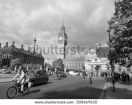 LONDON, UK - JUNE 09, 2015: Tourists in Parliament Square in Westminster in black and white