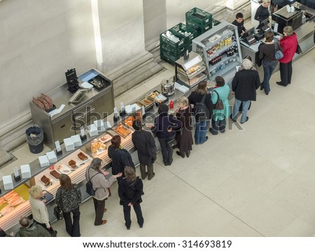 LONDON, UK - CIRCA MARCH, 2009: People queueing at the British Museum cafeteria bar in the Great Court