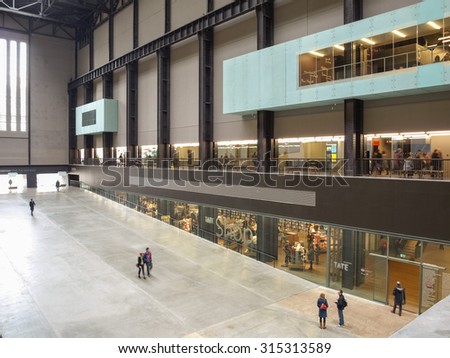 LONDON, UK - CIRCA MARCH, 2009: Tourists visiting the Turbine Hall which once housed the electricity generators of the power station now part of Tate Modern art gallery in South Bank