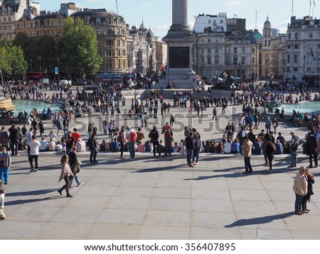 LONDON, UK - SEPTEMBER 27, 2015: Tourists in Trafalgar Square